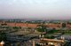 India: The Red Fort (Lahore Gate to the left and the Delhi Gate to the right) seen in the late afternoon from the minaret of the Jama Masjid, Delhi