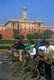 India: Early morning commuters in front of the Secretariat Building (Central Secretariat) home to India's government administration, Raisina Hill, New Delhi